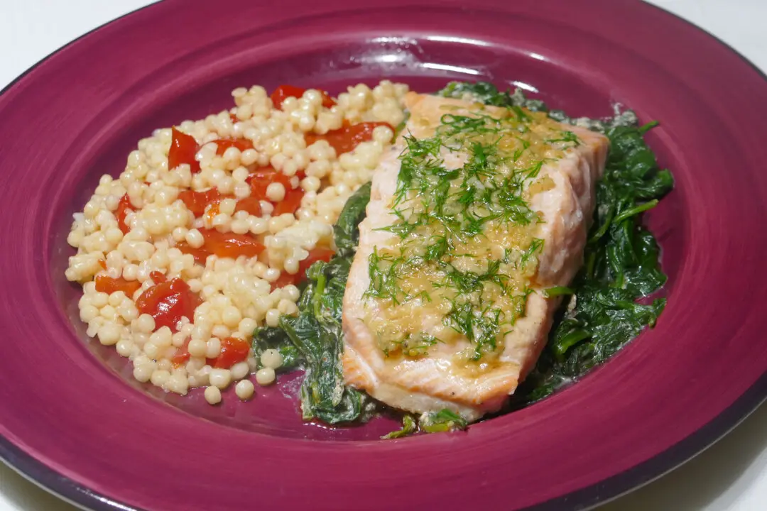 Garlic and Herb Salmon on Creamy Spinach With Pimento Couscous