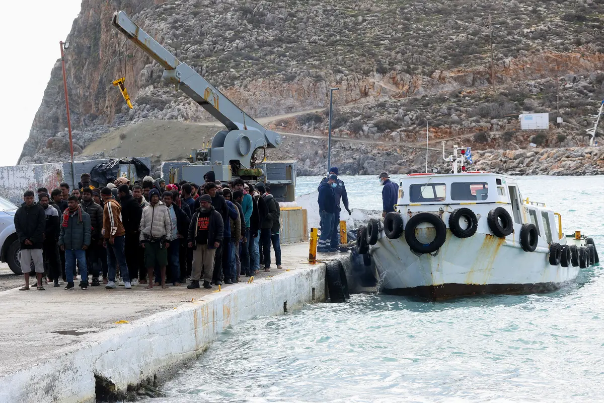 Day in Photos: Rescued Migrants, Highline Performance in Switzerland, and International Agricultural Show