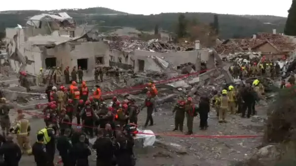 Israeli Security, Rescue Teams at Site Where a Home Was Hit During an Iranian Rocket Attack