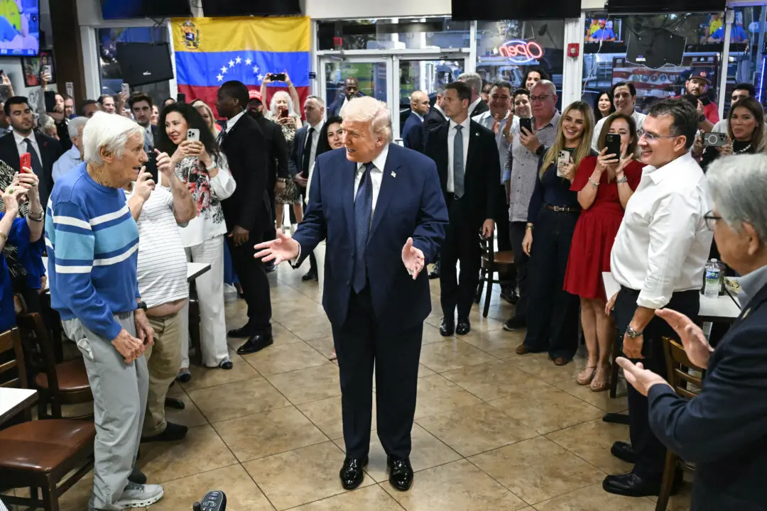 President Donald Trump speaks with supporters at Venezuelan restaurant El Arepazo in Miami on March 9, 2026. (Saul Loeb / AFP via Getty Images)