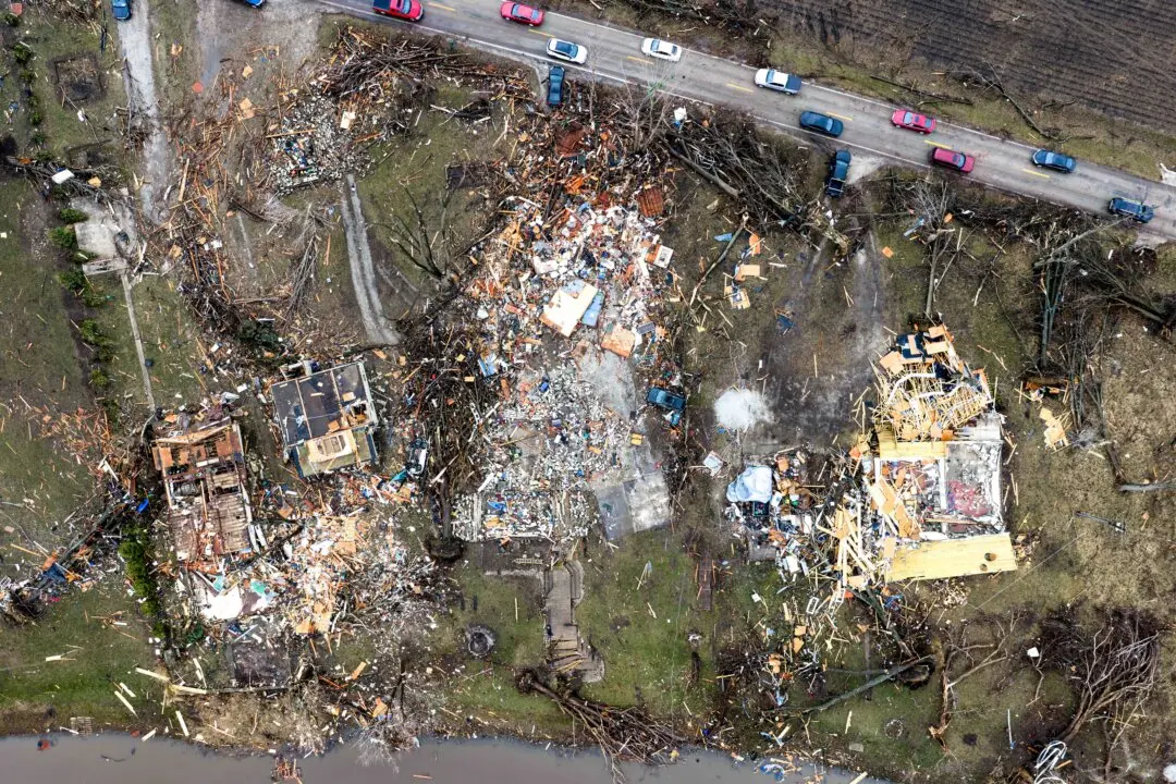 Homes reduced to rubble after being hit by yesterday's tornado in Aroma Park, Ill., on March 11, 2026. Several tornadoes passed through Indiana and Illinois yesterday, leaving behind a path of destruction and at least two people dead in Lake Village, Indiana. (Scott Olson/Getty Images)
