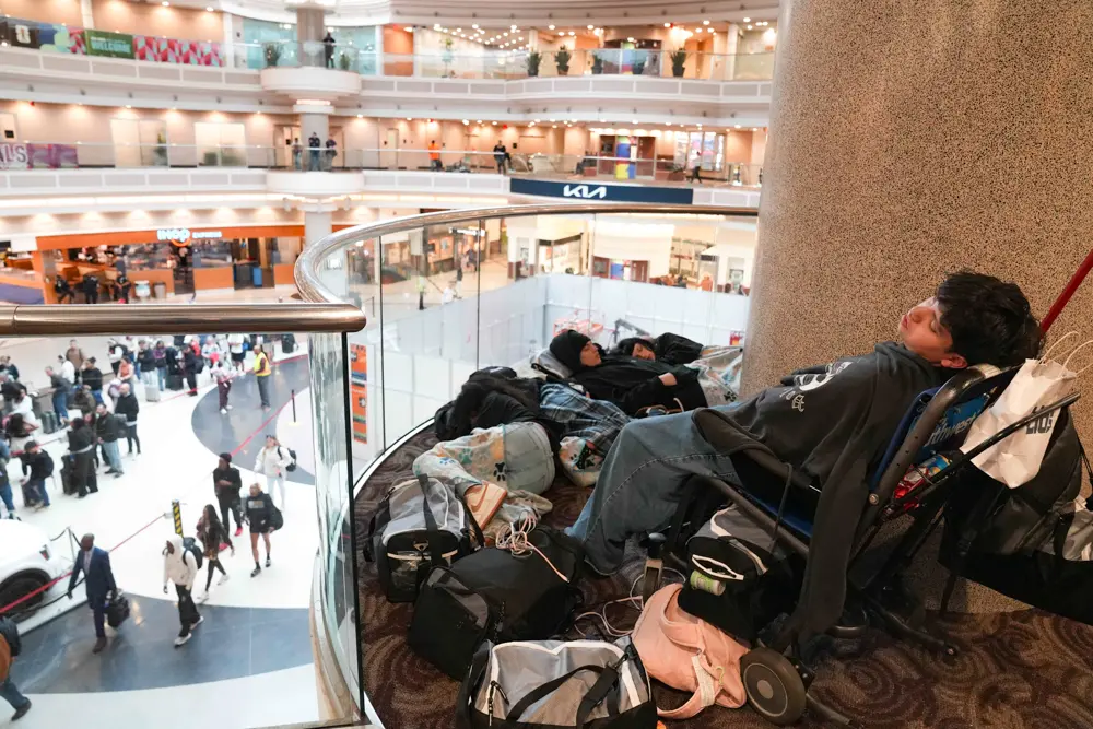 Travelers wait in long lines and sleep on the floor at Hartsfield-Jackson Atlanta International Airport on March 16, 2026 in Atlanta, Georgia. (Megan Varner/Getty Images)