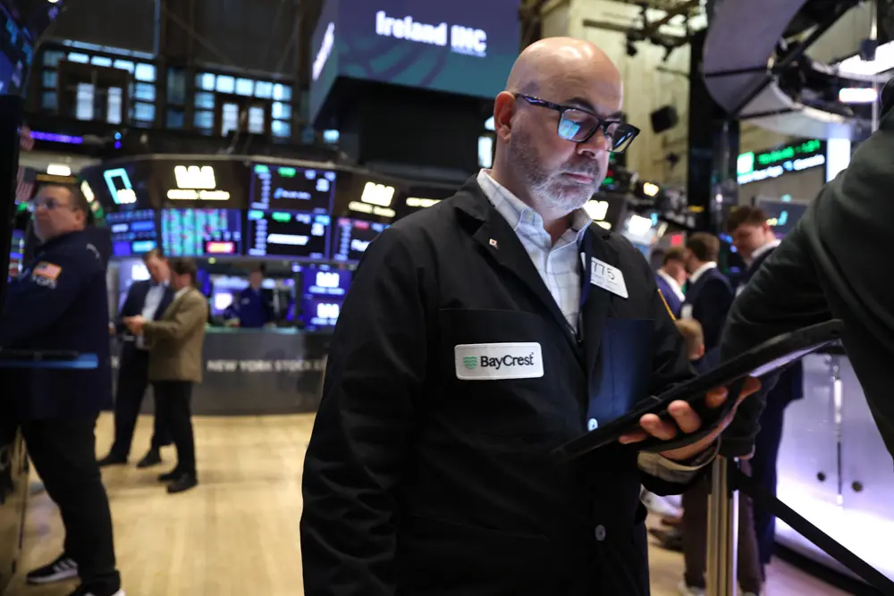 Traders work on the floor of the New York Stock Exchange (NYSE) at the opening bell in New York on March 16, 2026. (TIMOTHY A. CLARY / AFP via Getty Images)